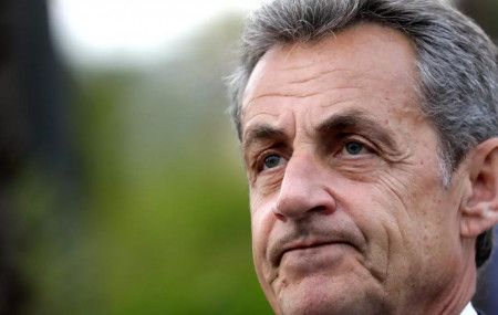 Former French President Sarkozy convicted of trying to bribe magistrate