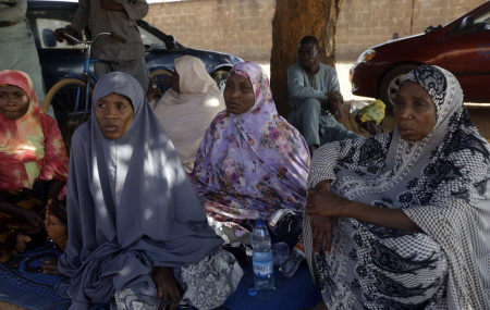 Parents of the missing Government Science secondary school students wait for news on their children in Kankara , Nigeria, Tuesday, Dec. 15, 2020.