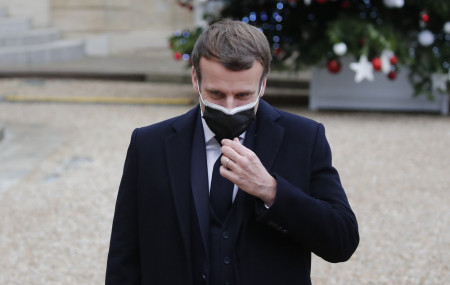 French President Emmanuel Macron reacts as he meets Portuguese Prime Minister Antonio Costa, Wednesday, Dec. 16, 2020 in Paris.