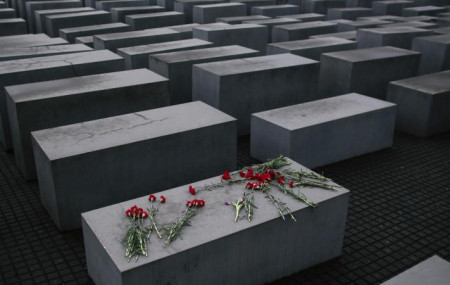 In this January 27, 2015 file photo, flowers lay on a concrete slab of the Holocaust Memorial.