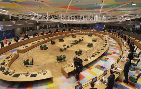 In this Thursday, Dec. 10, 2020 file photo, European Union leaders stand during a round table meeting at an EU summit in Brussels.