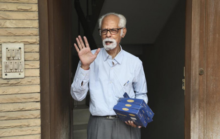 In this Nov. 8, 2020, file photo, Vice President Kamala Harris' maternal uncle, Balachandran Gopalan, talks to media outside his house, in New Delhi, India.