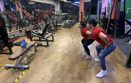 Bijender and Kanika Gautam, owners of the Ultra Bodies Fitness Studio, take online class from their closed Gyms on the outskirts of New Delhi, India, Thursday, June 10, 2021.