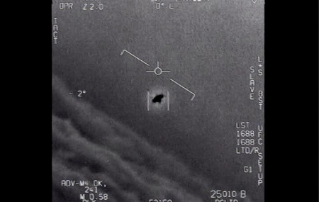 The image from video provided by the Department of Defense labelled Gimbal, from 2015, an unexplained object is seen at center as it is tracked as it soars high along the clouds, traveling ag