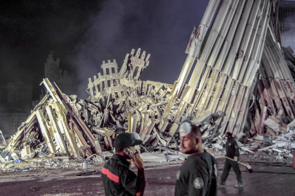 FILE - First responders work at ground zero after the Sept.11 attacks, Sept. 12, 2001, in New York. (AP/RSS Photo)