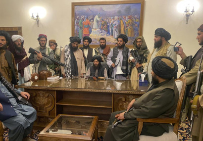 FILE - In this Aug. 15, 2021, file photo, Taliban fighters take control of the Afghan presidential palace in Kabul, Afghanistan, after President Ashraf Ghani fled the country.  AP/RSS Photo