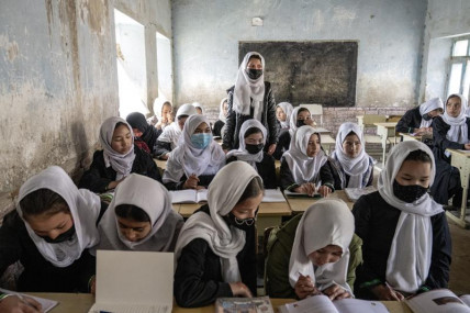 Afghan school girls attend their classroom on the first day of the new school year, in Kabul, Saturday, March 25, 2023.  AP/RSS Photo