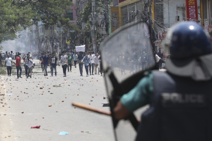 Students clash with riot police during a protest against a quota system for government jobs, in Dhaka, Bangladesh, Thursday, July 18, 2024. AP/RSS Photo