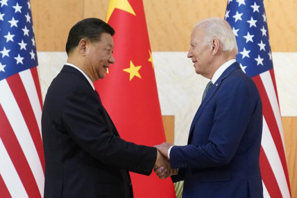 US President Joe Biden, right, and Chinese President Xi Jinping shake hands before their meeting on the sidelines of the G20 summit meeting, Monday, Nov 14, 2022, in Nusa Dua, in Bali, Indonesia. (AP/RSS Photo)