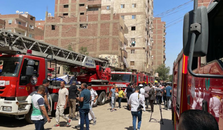 Emergency personnel work at the site of a fire at the Abu Sefein church that has killed over 40 people and injured at least 14 others, in the densely populated neighborhood of Imbaba, Cairo, Egypt, Sunday, Aug 14, 2022. (AP/RSS Photo)