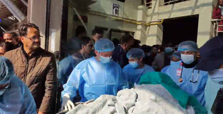 Lawmaker Bhandari being taken to the Tribhuvan International Airport from the Burn Hospital at Kirtipur on Thursday.