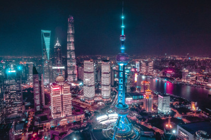 The skyline of Shanghai at night Rodrigo.Argenton, Wikimedia Commons