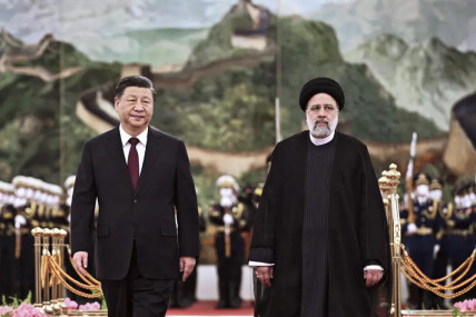 FILE - In this photo released by Xinhua News Agency, visiting Iranian President Ebrahim Raisi, right, walks with Chinese President Xi Jinping after reviewing an honor guard during a welcome ceremony at the Great Hall of the People in Beijing, Tuesday, Feb 14, 2023. (AP/RSS Photo)