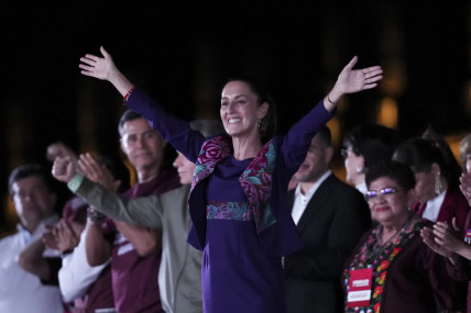 President-elect Claudia Sheinbaum waves to supporters at the Zocalo, Mexico City’s main square, after the National Electoral Institute announced she held an irreversible lead in the election, early Monday, June 3, 2024.  AP/RSS Photo