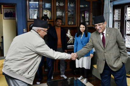 File Photo of Oli (l) and Dahal