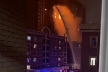 In this image taken from video, firefighters spray water on a fire at a residential building in Urumqi in western China's Xinjiang Uyghur Autonomous Region, Thursday, Nov. 24, 2022. AP/RSS Photo