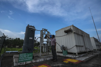 An officer checks a part of a hydrogen plant at Oil India Limited in Jorhat, India, Aug. 17, 2023. AP/RSS Photo