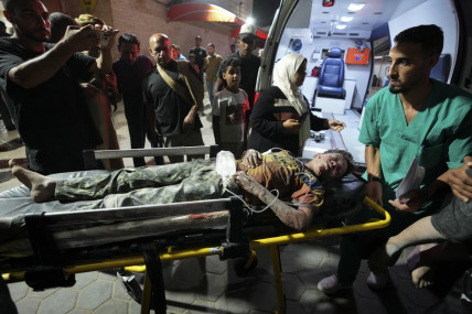 A Palestinian wounded in an Israeli bombardment on the Gaza Strip is brought to Al Aqsa hospital in Deir al Balah, central Gaza Strip, on Sunday, May 26, 2024. AP/RSS Photo