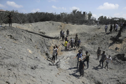 Palestinians search for bodies and survivors in a site hit by an Israeli bombardment on Khan Younis, southern Gaza Strip, Saturday, July 13, 2024. Israel said it targeted Hamas’ shadowy military commander in a massive strike Saturday in the crowded southern Gaza Strip that killed at least 71 people, according to local health officials. Hamas immediately rejected the claim that Mohammed Deif was in the area.  AP/RSS Photo