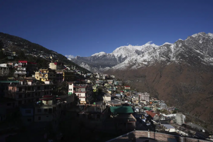 Joshimath town is seen along side snow capped mountains, in India's Himalayan mountain state of Uttarakhand, Jan. 21, 2023. AP/RSS Photo