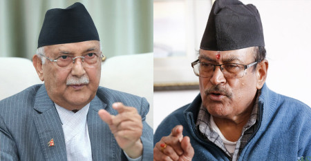 KP Sharm Oli (left) and Gauri Bahadur Karki/>
                                                                    </figure>
                                <span class=