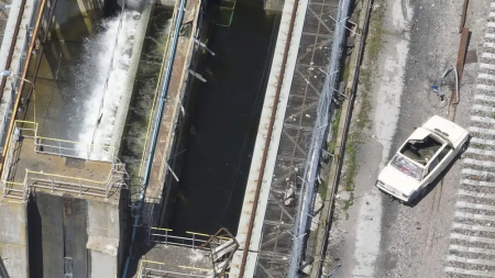 This photo taken from drone footage, provided by the Ukrainian military and dated May 28, 2023, shows a car on the Kakhovka Dam that appears to be laden with explosives. The dam collapsed June 6, while it was under Russian control.  AP/RSS Photo