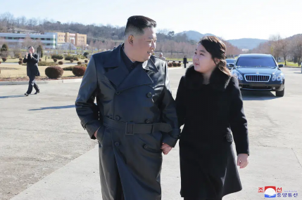 This undated photo provided on Nov. 27, 2022, by the North Korean government shows North Korean leader Kim Jong Un, left, and his daughter, right, walk to a photo session with those involved in the recent launch of what it says a Hwasong-17 intercontinental ballistic missile, at an unidentified location in North Korea. AP/RSS Photo