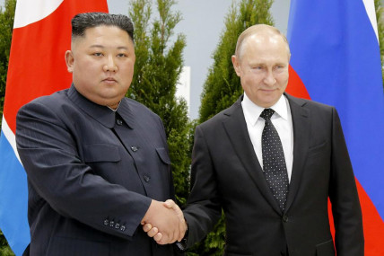 FILE - Russian President Vladimir Putin, right, and North Korea's leader Kim Jong Un shake hands during their meeting in Vladivostok, Russia on April 25, 2019. AP/RSS Photo