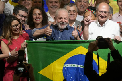 Former Brazilian President Luiz Inacio Lula da Silva celebrates with his wife Rosangela Silva, left, and running mate Geraldo Alckmin, right, after defeating incumbent Jair Bolsonaro in a presidential run-off to become the country's next president, in Sao Paulo, Brazil, Sunday, Oct 30, 2022. (AP/RSS Photo)