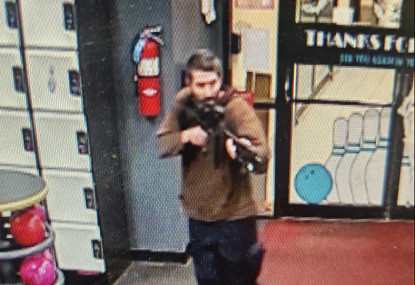 In this image taken from video released by the Androscoggin County Sheriff’s Office, an unidentified gunman points a gun while entering Sparetime Recreation in Lewiston, Maine, on Wednesday, Oct. 25, 2023. (AP/RSS Photo)