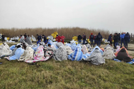 Rescued migrants sit covered in blankets at a beach near Cutro, southern Italy, Sunday, Feb. 26, 2023. Rescue officials say an undetermined number of migrants have died and dozens have been rescued after their boat broke apart off southern Italy. AP/RSS Photo