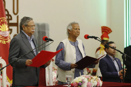 Bangladesh’s figurehead President Mohammed Shahabuddin administers the oath of office to Nobel laureate Muhammad Yunus, right, as the head of Bangladesh’s interim government, in Dhaka, Bangladesh, Thursday, Aug. 8, 2024. AP/ RSS Photo