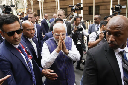 Indian Prime Minister Narendra Modi greets supporters as he arrives in New York on Tuesday, June 20, 2023. AP/RSS Photo