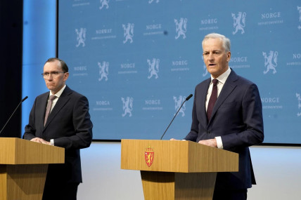 Norway’s Prime Minister Jonas Gahr Store, right, with Foreign Minister Espen Barth Eide, speaks during a news conference in Oslo, Norway, Wednesday, May 22, 2024. (AP Photo)