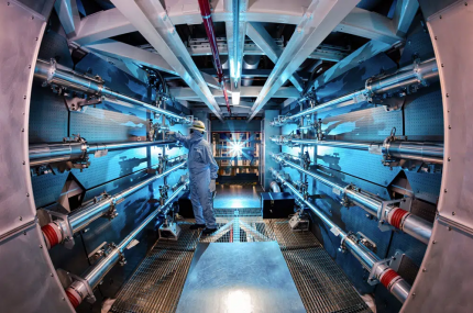 In this 2012 image provided by Lawrence Livermore National Laboratory, a technician reviews an optic inside the preamplifier support structure at the Lawrence Livermore National Laboratory in Livermore, California. AP/RSS Photo