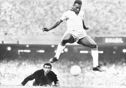 FILE - Brazil's Pele scores past Venezuela's goal keeper Fabrizio Fasano in Rio de Janeiro, Brazil, Aug. 24, 1969. AP/RSS Photo