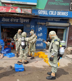 This photo provided by India's National Disaster Response Force (NDRF) shows NDRF personnel engaged in evacuating people following a gas leak in Giaspura, Ludhiana, Punjab, India, Sunday, April 30, 2023. (AP/RSS)