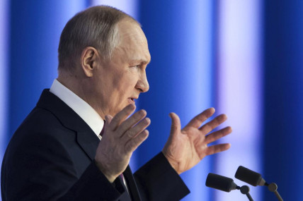 Russian President Vladimir Putin gestures as he gives his annual state of the nation address in Moscow, Russia, Tuesday, Feb. 21, 2023. AP/RSS Photo