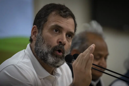 FILE- Indian opposition leader Rahul Gandhi addresses a press conference after he was expelled from parliament after a court convicted him of defamation and sentenced him to two years in prison for mocking the surname Modi in an election speech, in New Delhi, India, March 25, 2023. AP/RSS Photo