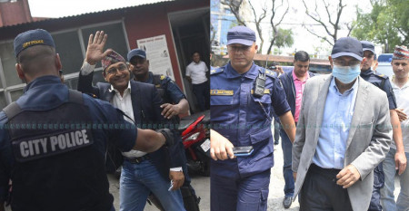 FILE - Rayamajhi (left) and Khand arrested in connection with the fake Bhutanese refugees scam.