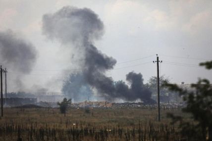 Smoke rises over the site of explosion at an ammunition storage of Russian army near the village of Mayskoye, Crimea, Tuesday, Aug. 16, 2022. AP/RSS Photo