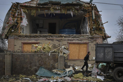 A local resident works to clean the debris from damaged house after Russian shelling in Kramatorsk, Ukraine, Thursday, Nov 10, 2022. (AP/RSS Photo)