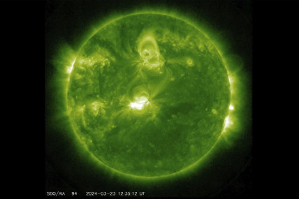 This image provided by NASA shows the Sun seen from the Solar Dynamics Observatory (SDO) satellite on Saturday, March 23, 2024. Space weather forecasters have issued a geomagnetic storm watch through Monday, March 25, 2024, saying an ouburst of plasma from a solar flare could interfere with radio transmissions on Earth and make for great aurora viewing.
