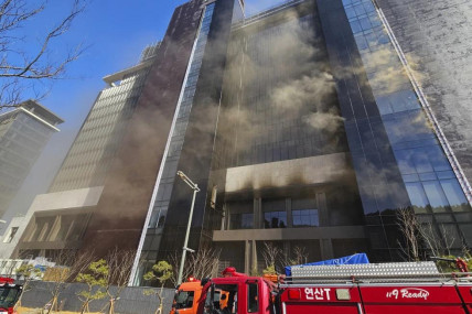 Smoke billows from a construction site in Busan, South Korea, Friday, Feb. 14, 2025. (AP)