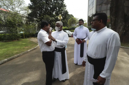 A Catholic priest tries to console a family member of one of the deceased after Sri Lanka’s Supreme Court pronounced judgment on the 2019 Easter Sunday bomb attacks in Colombo, Sri Lanka, Thursday, Jan.12, 2023. AP/RSS Photo