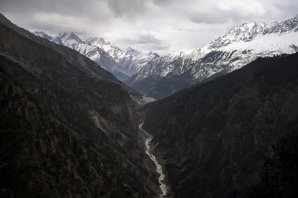 FILE - The Sutlej River flows in the valley below the tall snowy peaks in the Kinnaur district of the Himalayan state of Himachal Pradesh, India, March 13, 2023. AP/RSS Photo