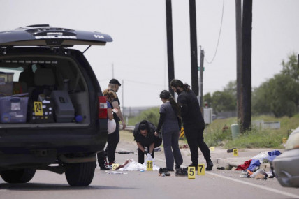 Emergency personnel respond to a fatal collision in Brownsville, Texas, on Sunday, May 7, 2023. Several migrants were killed after they were struck by a vehicle while waiting at a bus stop near Ozanam Center, a migrant and homeless shelter. AP/RSS Photo