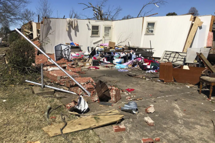 Debris covers the ground around damaged homes in Wynne, Arkansas, on Saturday, April 1, 2023. AP/RSS Photo