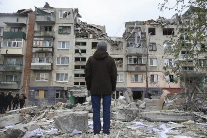 A local resident looks at his home, damaged by a Russian rocket attack in Sloviansk, Donetsk region, Ukraine, Friday, Apr. 14, 2023. AP/RSS Photo