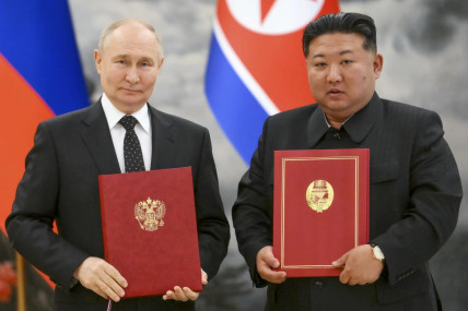 FILE - Russian President Vladimir Putin, left, and North Korea's leader Kim Jong Un pose for a photo during a signing ceremony of the new partnership in Pyongyang, North Korea, on June 19, 2024. (AP)